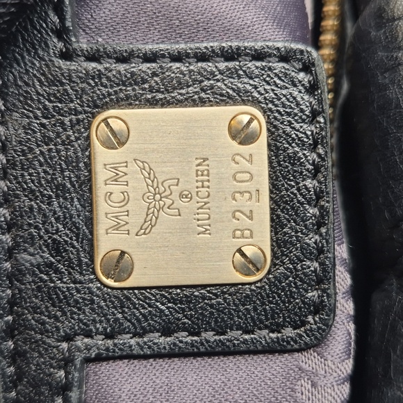 MCM Black Leather Handbag with Gold Accents - Picture 11 of 17